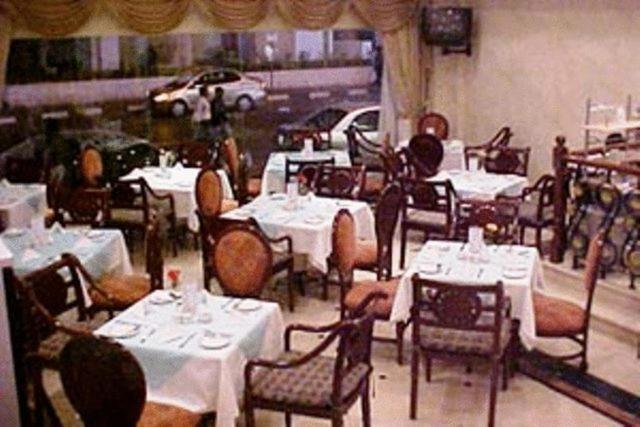 Ramee Hotel Apartments Дубай Ресторан фото