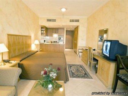 Ramee Hotel Apartments Дубай Номер фото